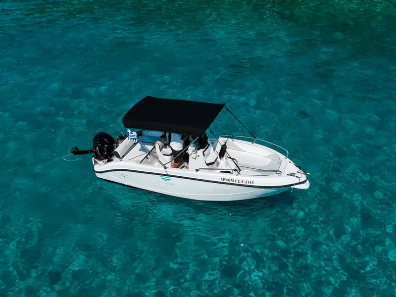 Trimarchi 5.7s day boat with bow sunbed on calm Ionian water